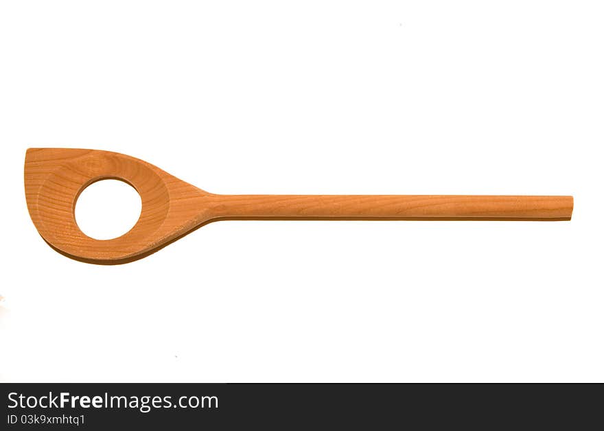 Wooden spoon with hole