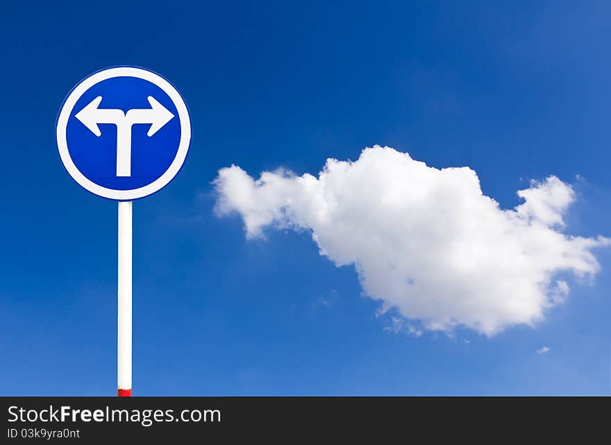 Curved Road Traffic Sign over blue sky,turn left