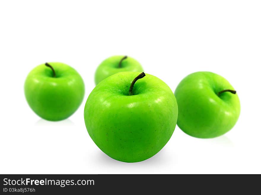 Green apple on the white background