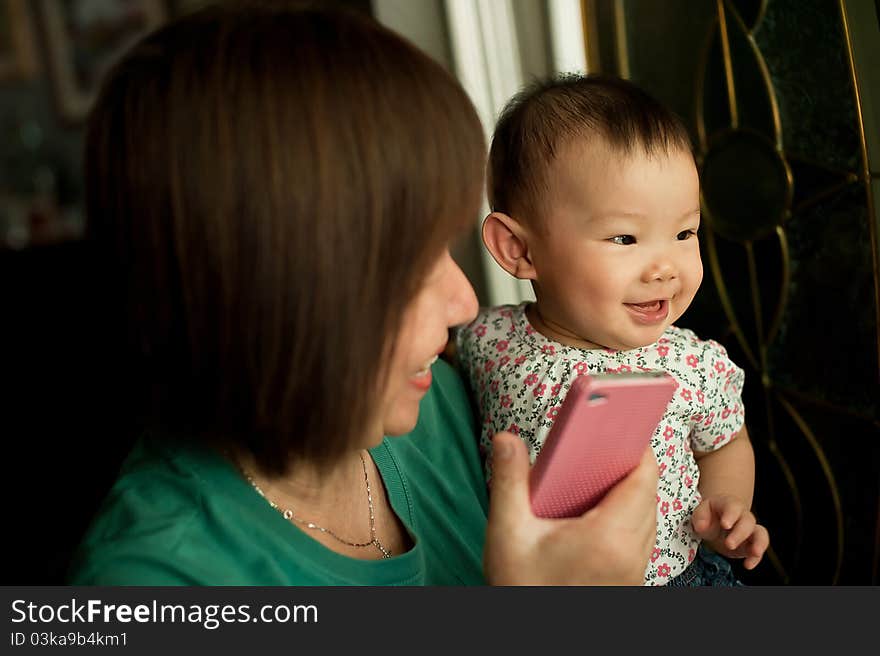 Grandmother and child smiling