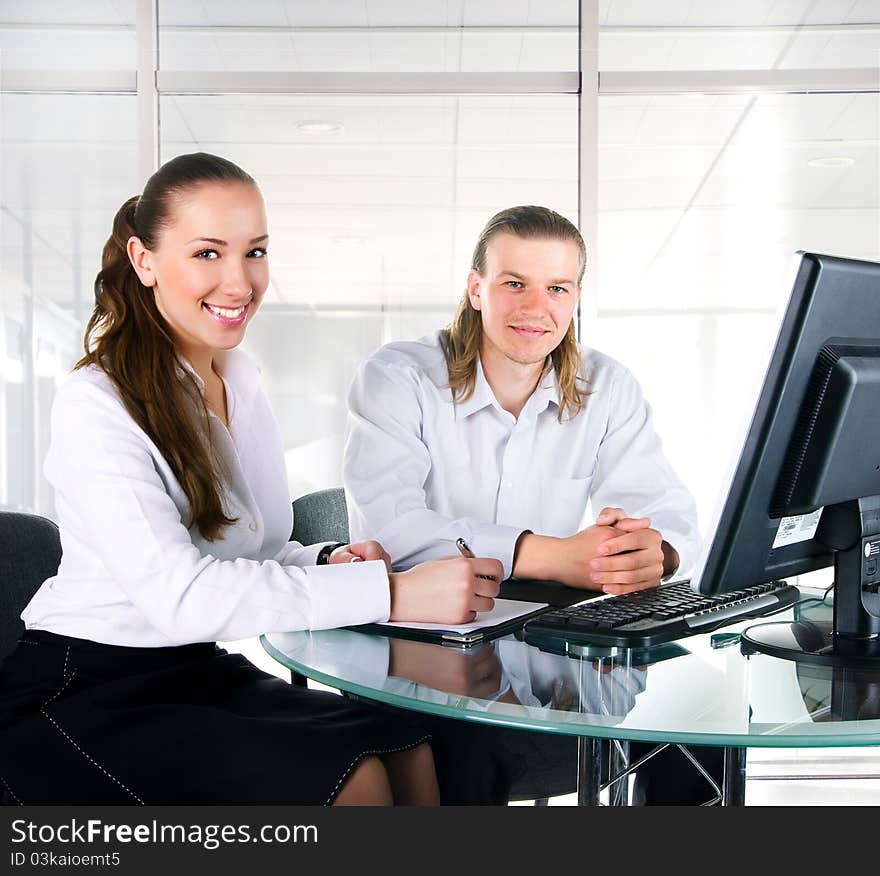 Two business people working in team on the office