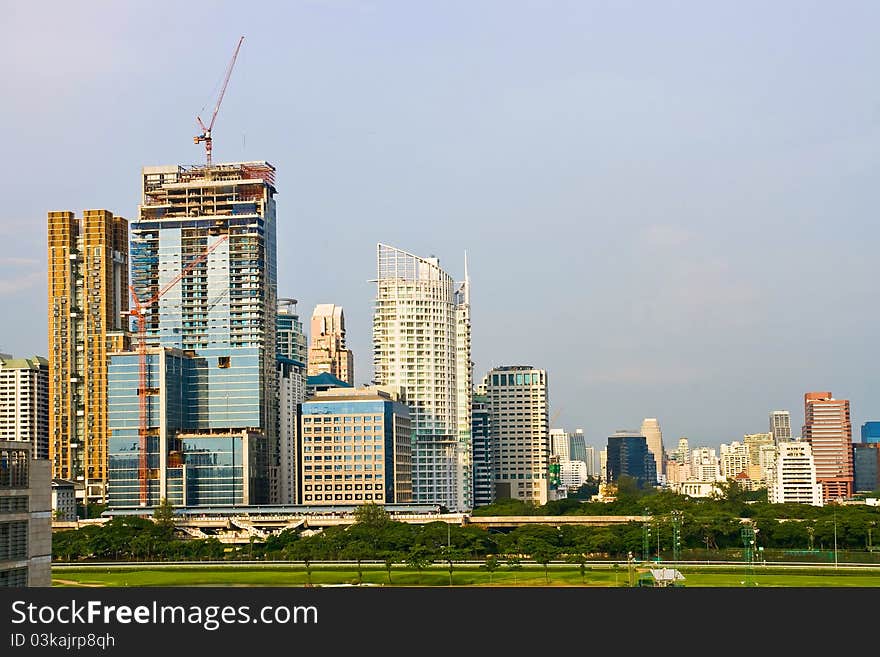 Skyscraper Office Tower  in Bangkok Thailand with green diving range