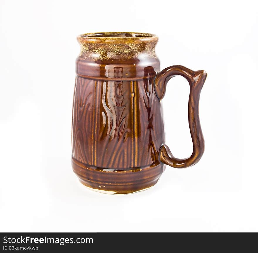 Brown empty goblet of beer isolated on a white background