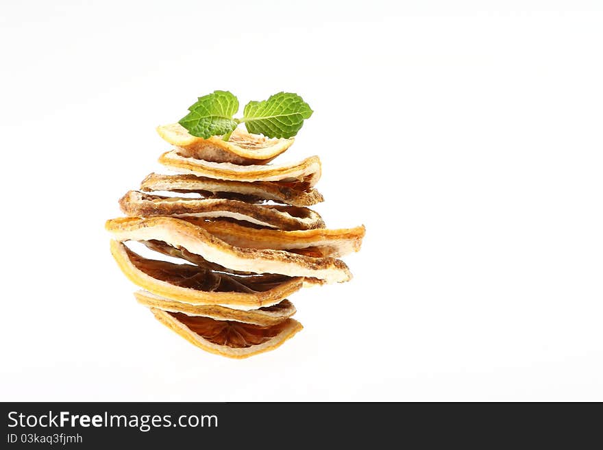 Dried citrus slice on white background