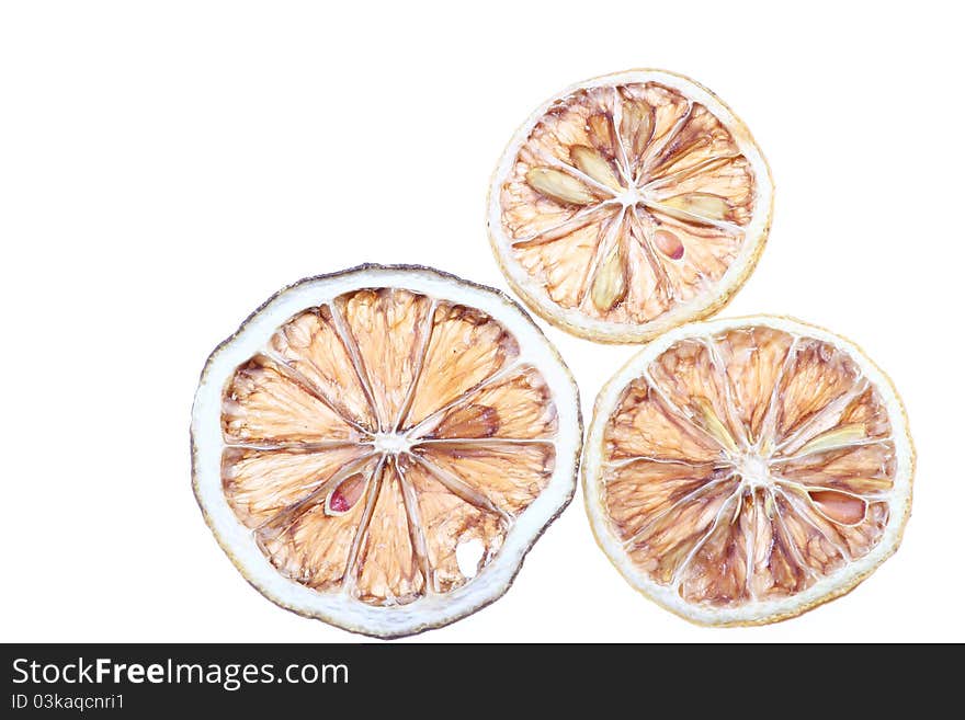 Desiccated citrus slice on white background. Desiccated citrus slice on white background