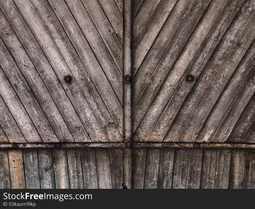 Weathered wood wall texture, perfect as a background. Weathered wood wall texture, perfect as a background