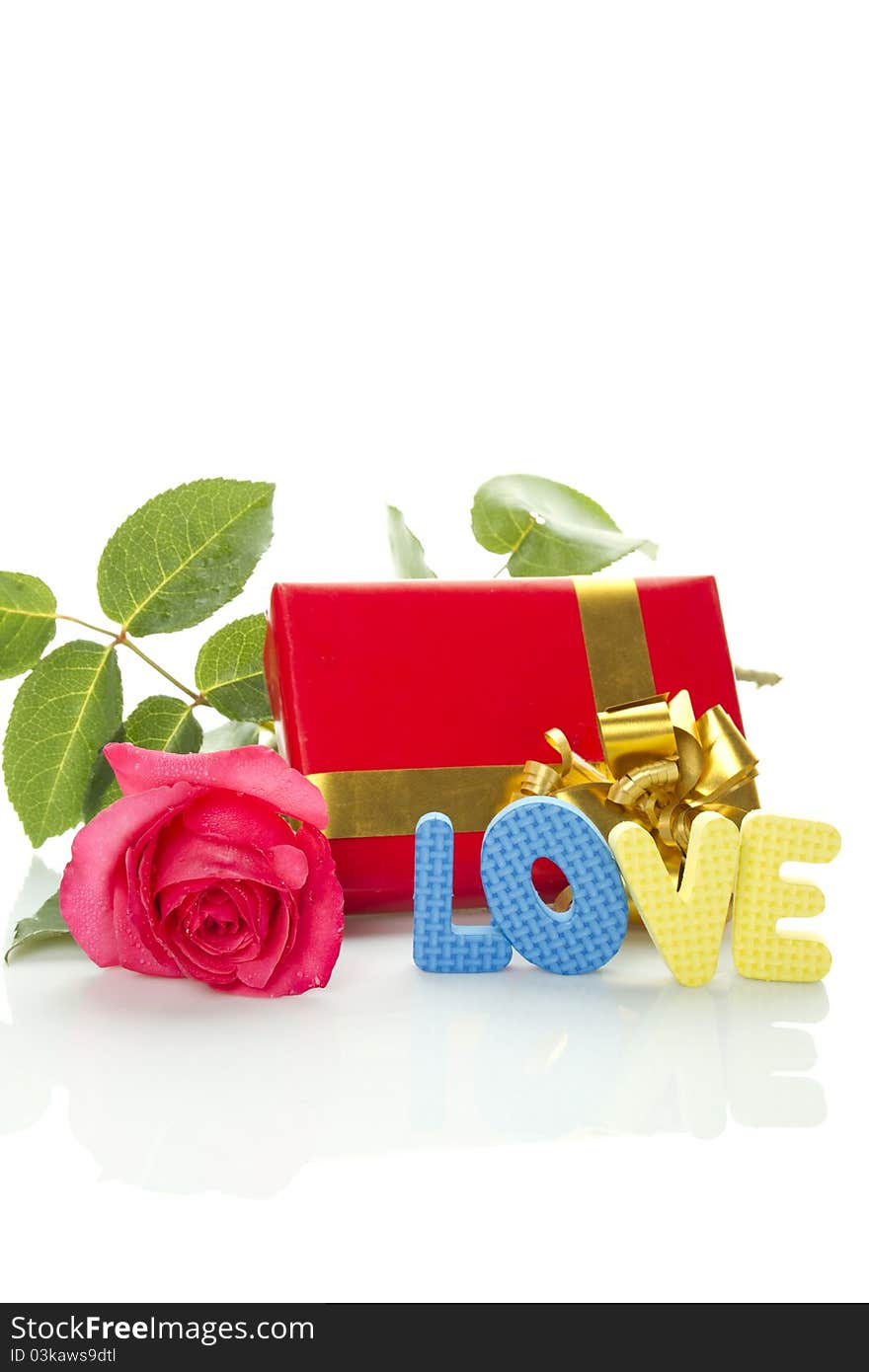 Red Rose, gift box and the text LOVE