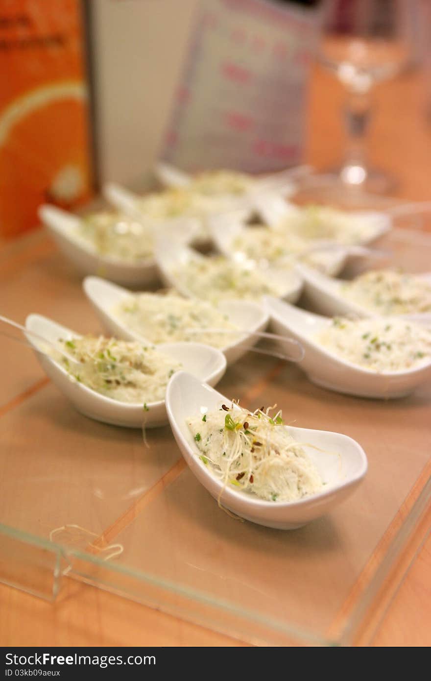 Appetizer with fish and soya at a cocktail