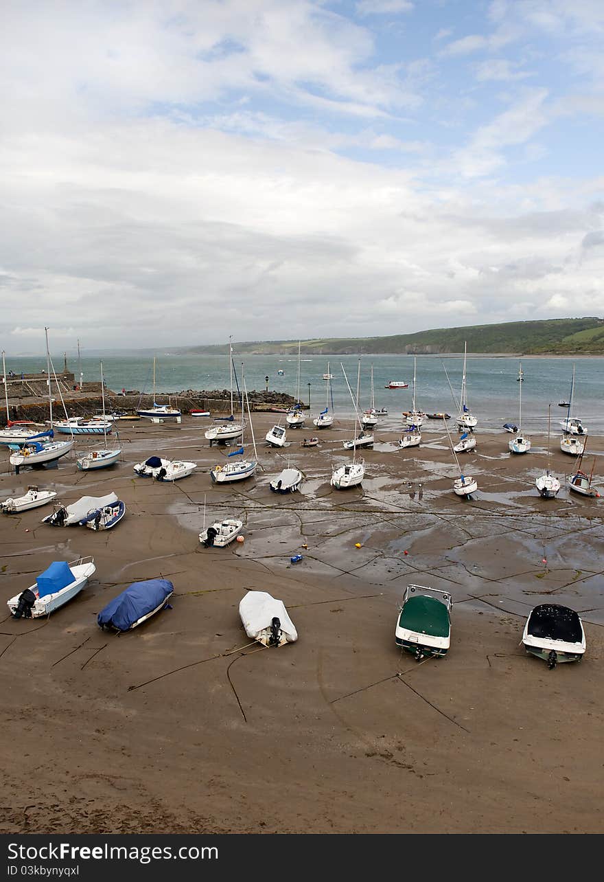 New Quay Harbour at low tide, West Wales, united Kingdom. New Quay Harbour at low tide, West Wales, united Kingdom