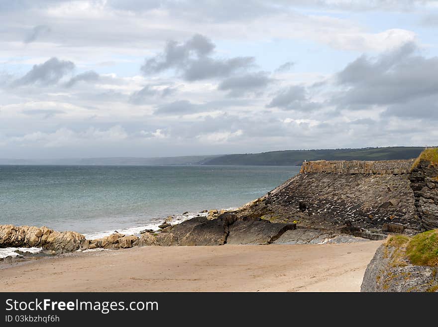 New Quay beach at low tide, looking noth to AberaeronWest Wales, united Kingdom. New Quay beach at low tide, looking noth to AberaeronWest Wales, united Kingdom