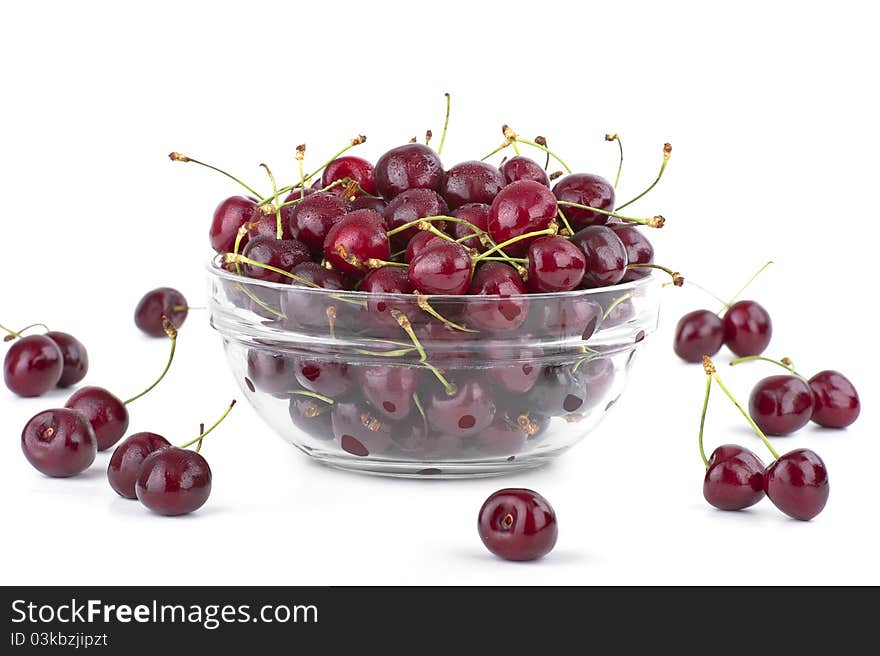 Bowl full of cherries on white background. Bowl full of cherries on white background.