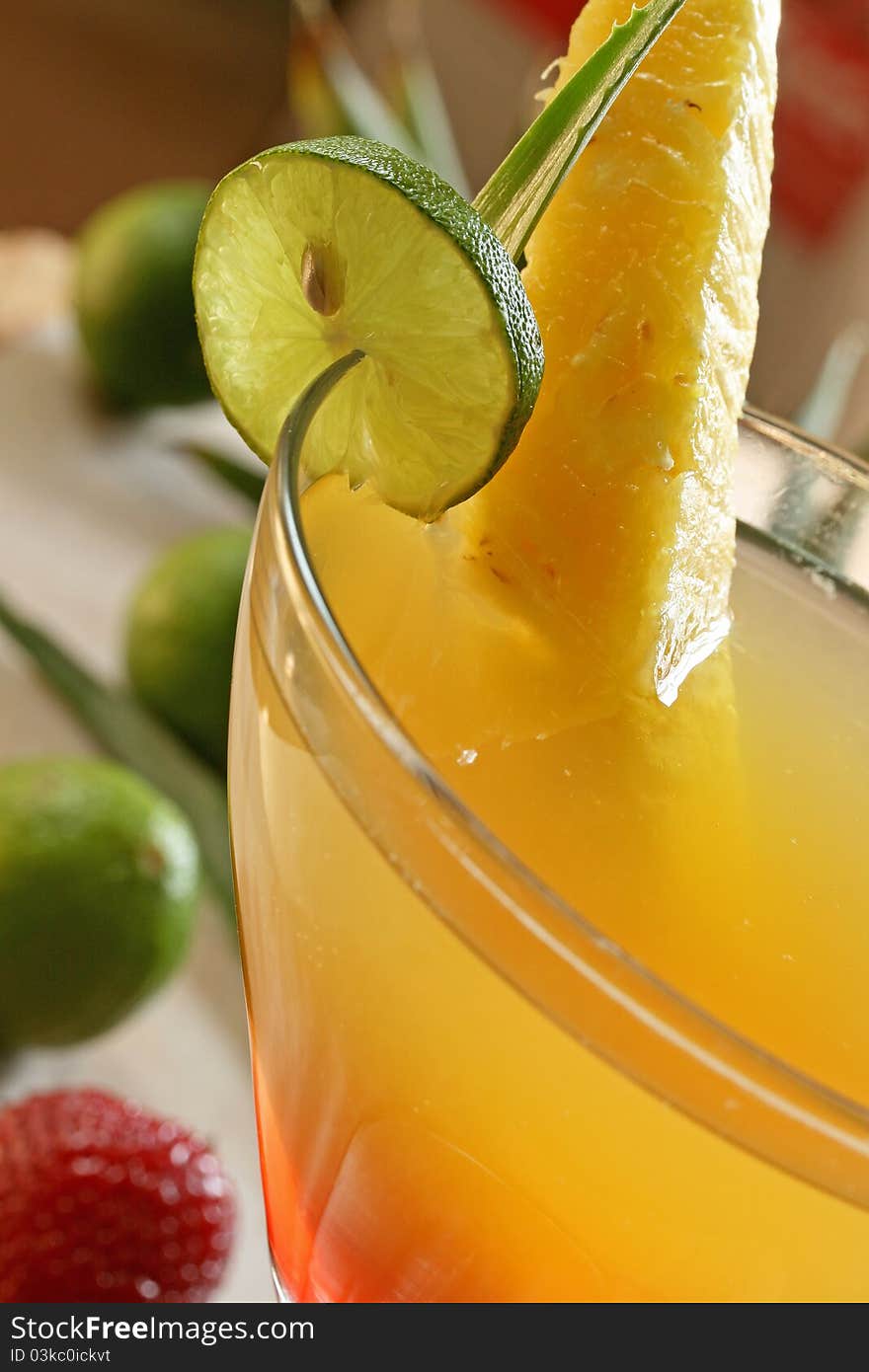 Close up of pineapple cocktail with lime