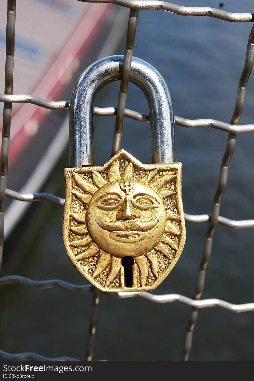 Padlock hung by lovers on a bridge in Krakow. Padlock hung by lovers on a bridge in Krakow