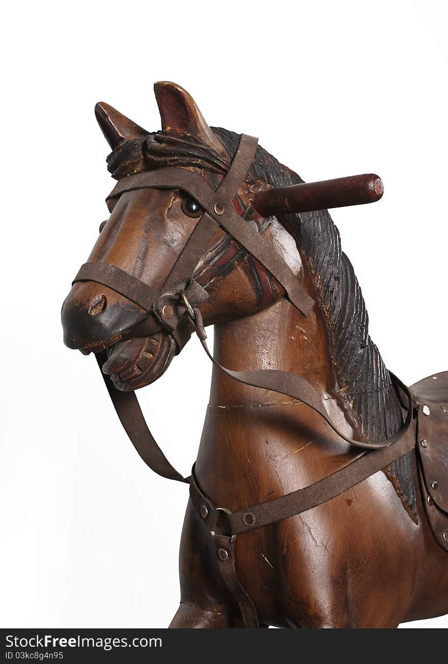 Wooden rocking horse head on white background