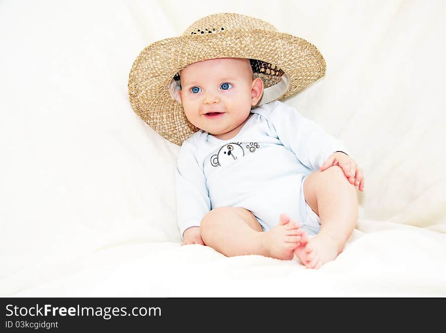 Little boy with blue eyes and hat. Little boy with blue eyes and hat