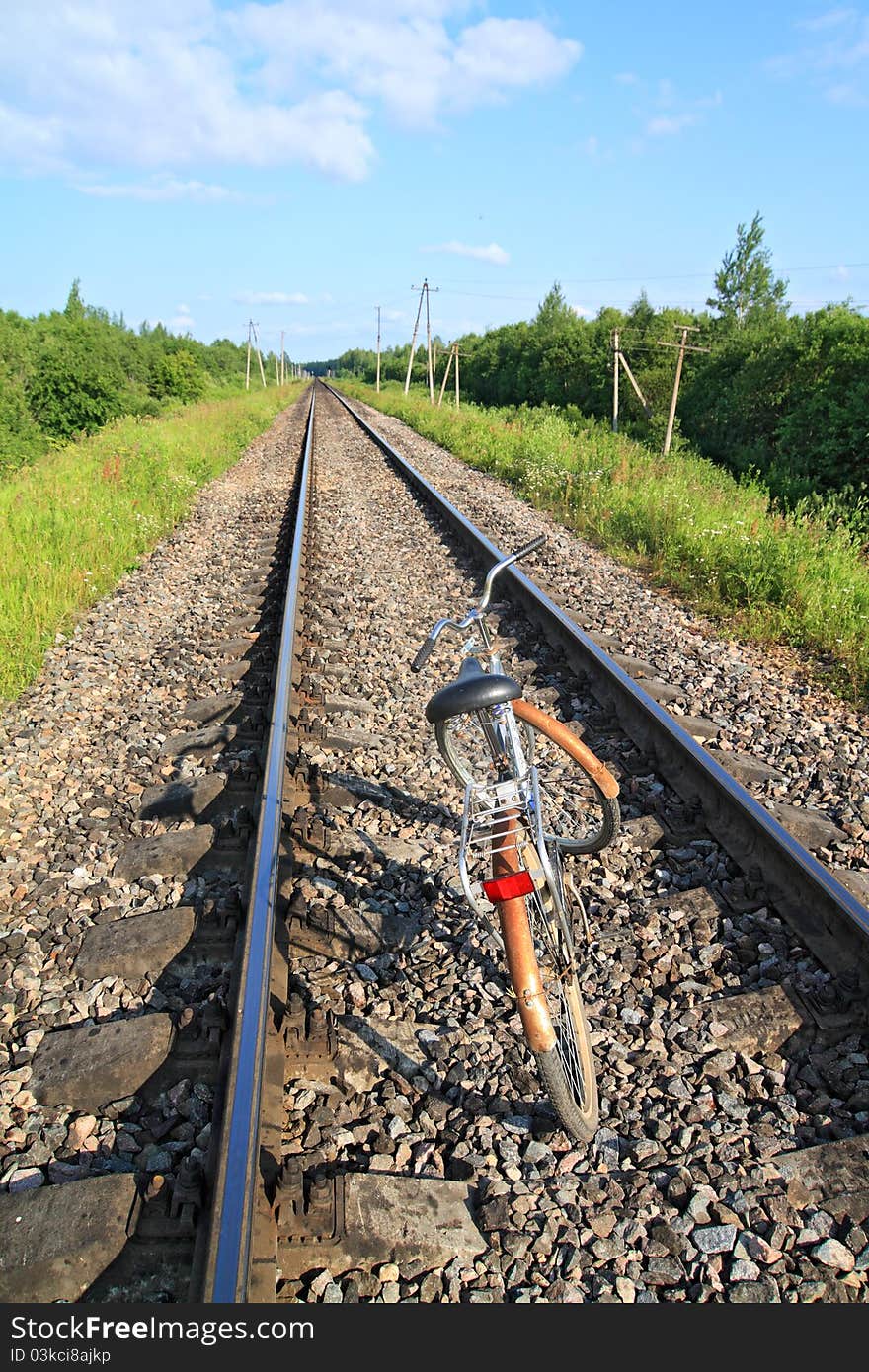 Old rusty bicycle on railway. Old rusty bicycle on railway