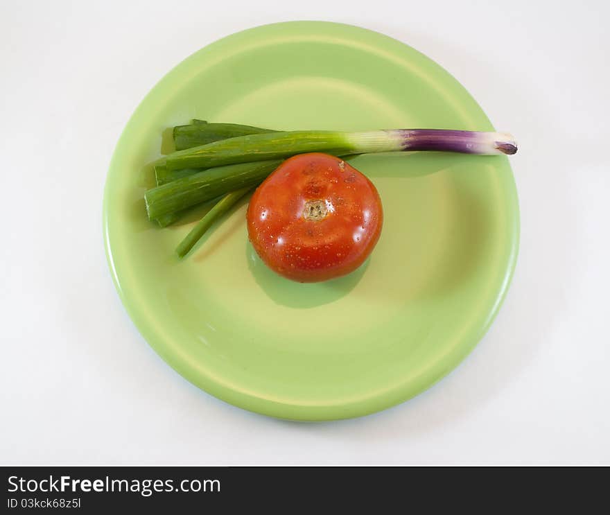 Tomato and onion dish with white background isolated. Tomato and onion dish with white background isolated