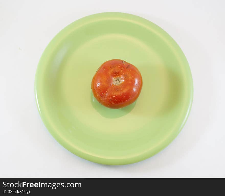 Dish with tomato isolated on white background. Dish with tomato isolated on white background