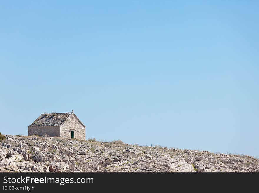 Old church on an stone island in Croatia