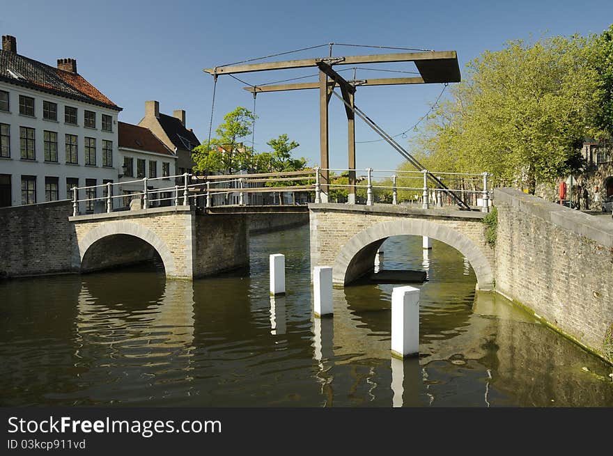 A lifting bridge over a river in Brugge in Belgium