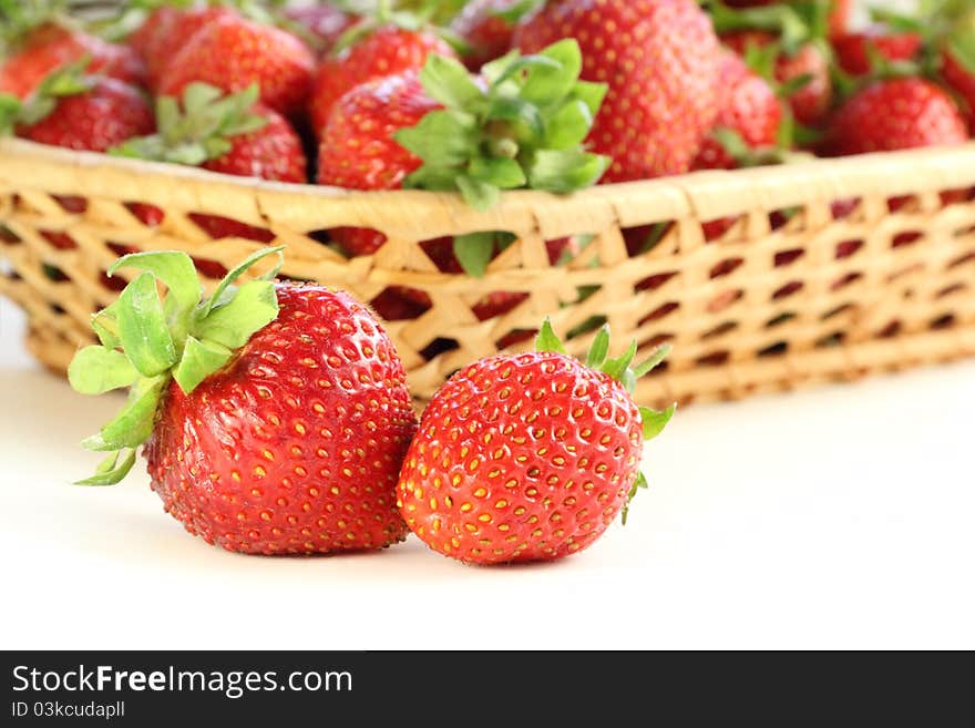 Fresh, juicy and healthy strawberries, red on white