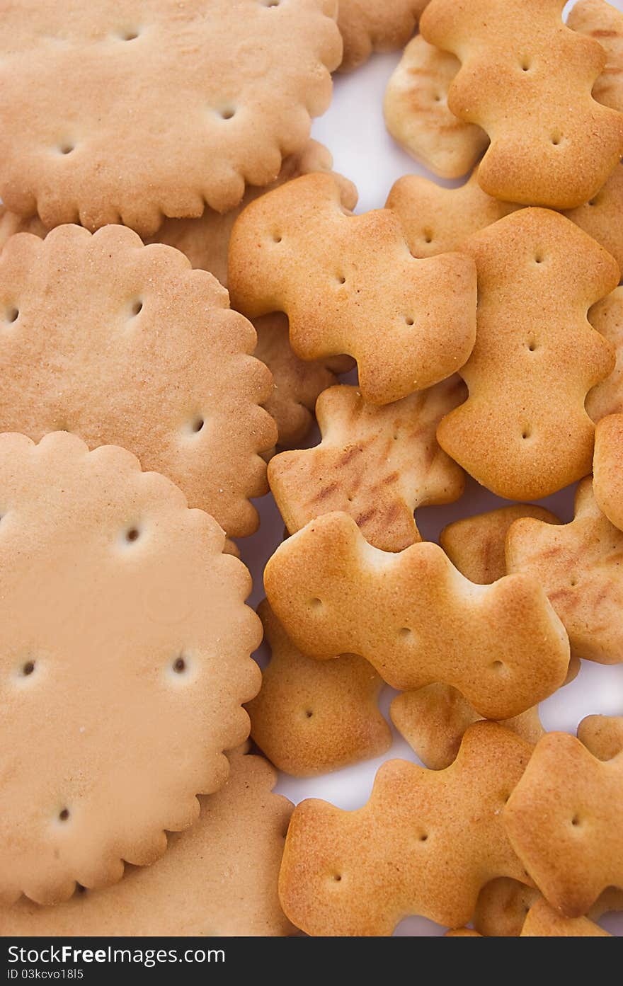 Round and shaped salted crackers in pile