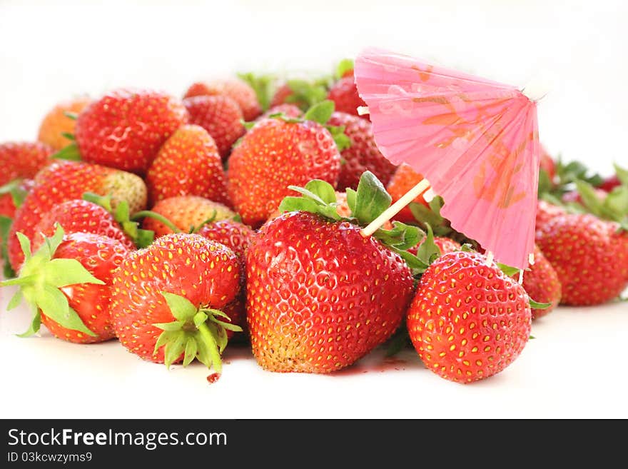 Fresh, juicy and healthy strawberries, red on white