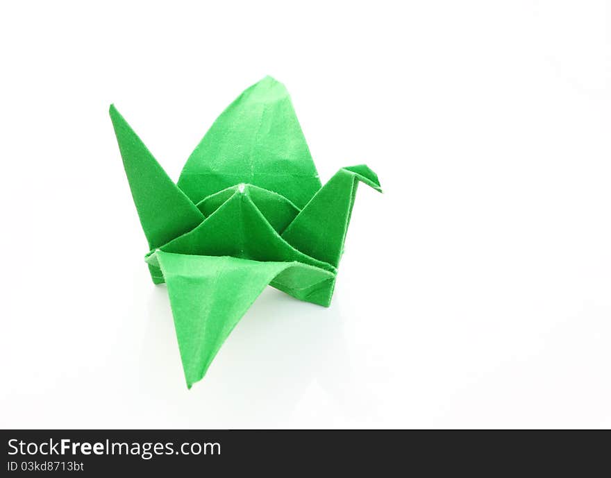 Green Origami bird isolate on white background. Green Origami bird isolate on white background