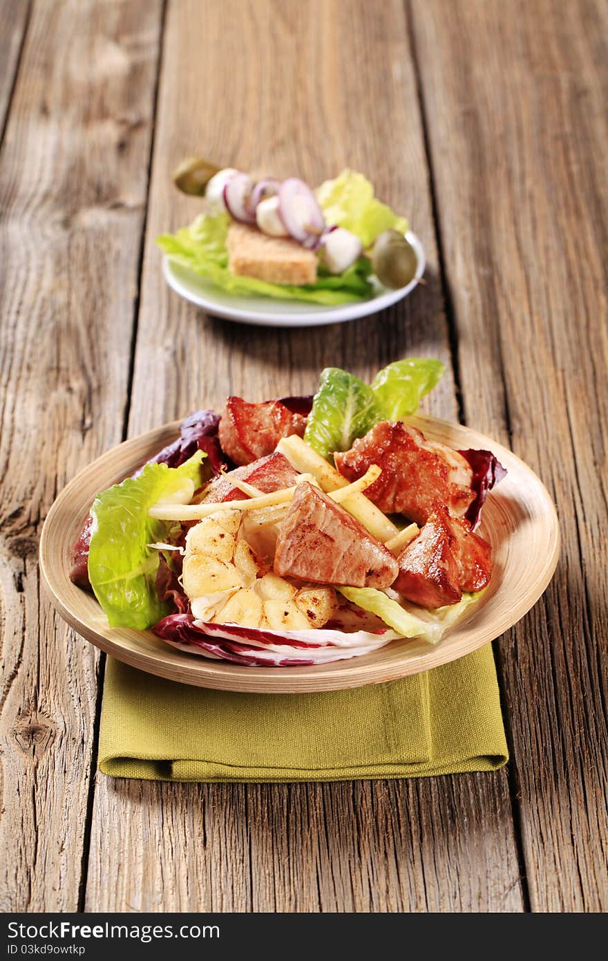 Pan fried pork and vegetable salad