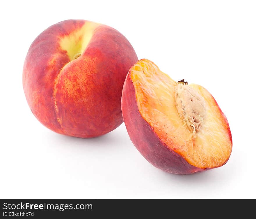 Peach and half isolated on white background