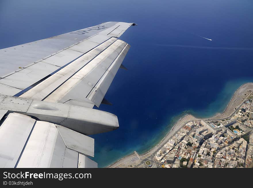 Island Resort Through Window Of An Aircraft