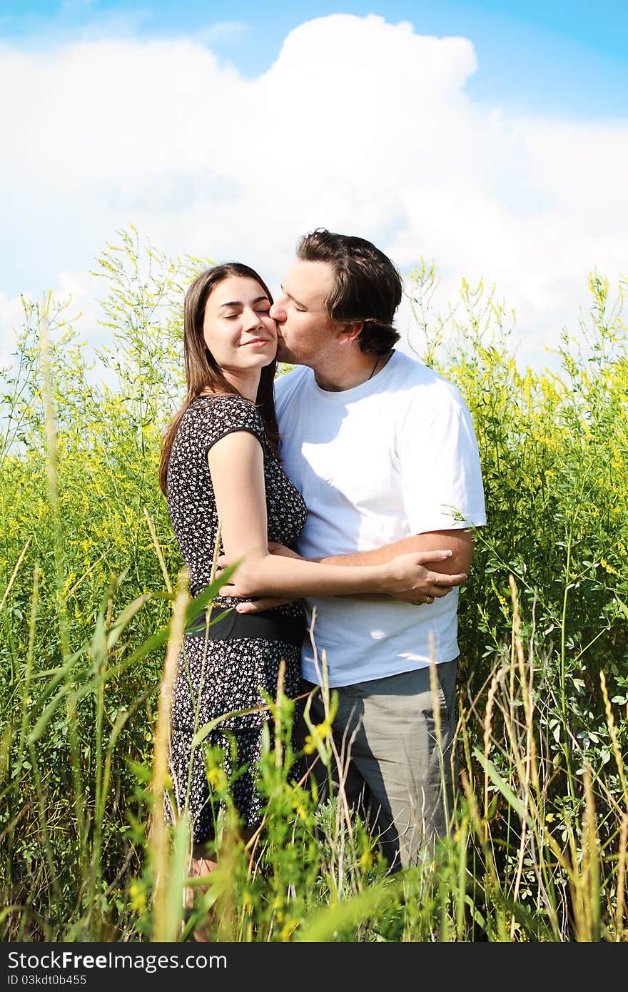 Couple in love in the summer field