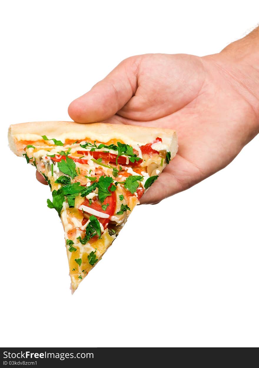 Hand holding cut off slice pizza isolated on white background