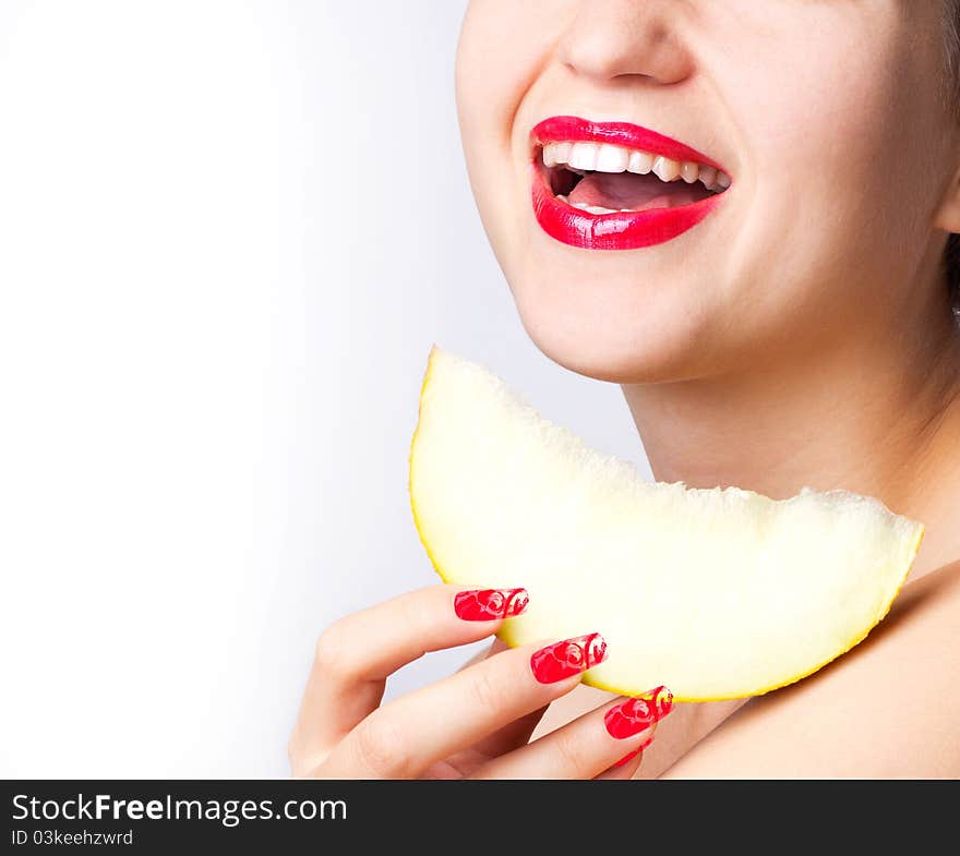 Beautiful smiling woman with lobule of melon. Beautiful smiling woman with lobule of melon