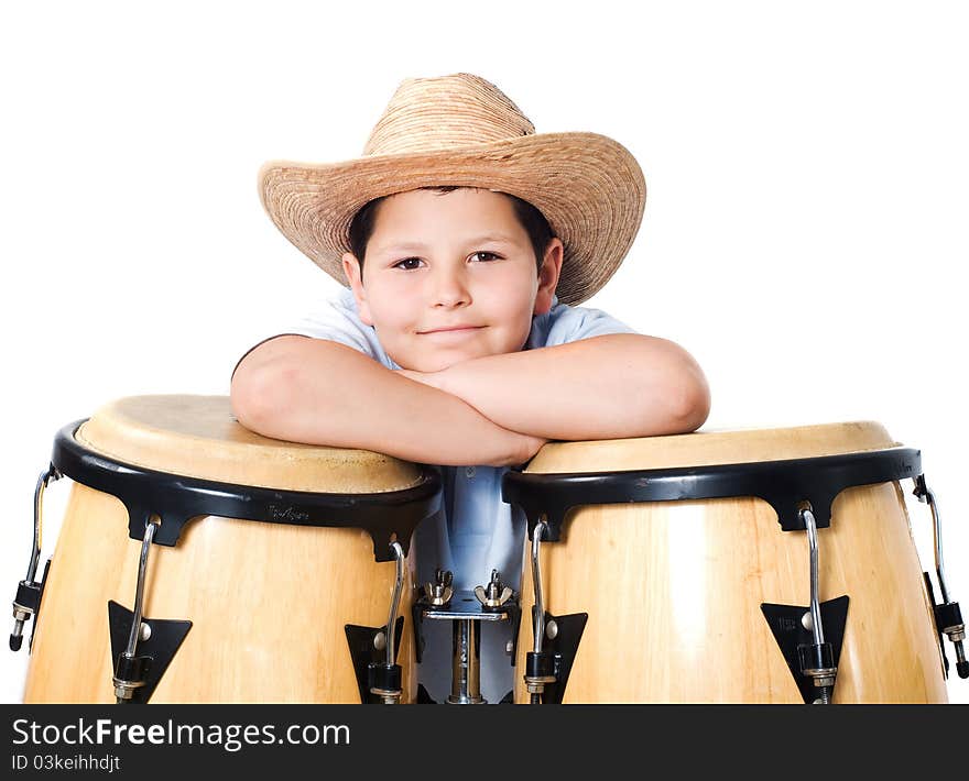 A boy wearing a hat with the drums on a white background. A boy wearing a hat with the drums on a white background