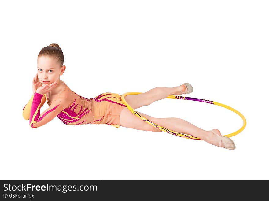 Young gymnast performs exercises with a hoop