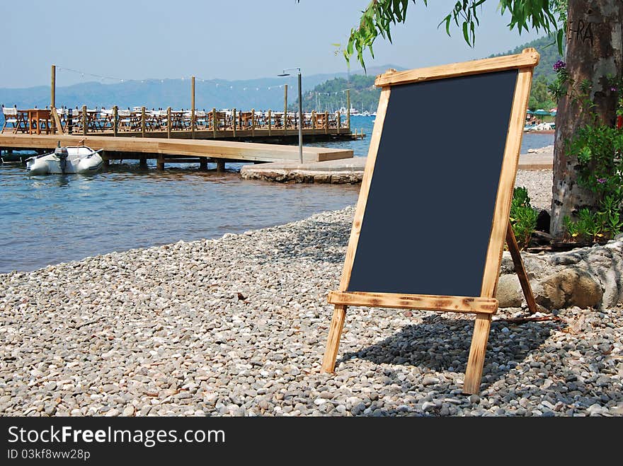 Empty (clear) board on the beach. Empty (clear) board on the beach