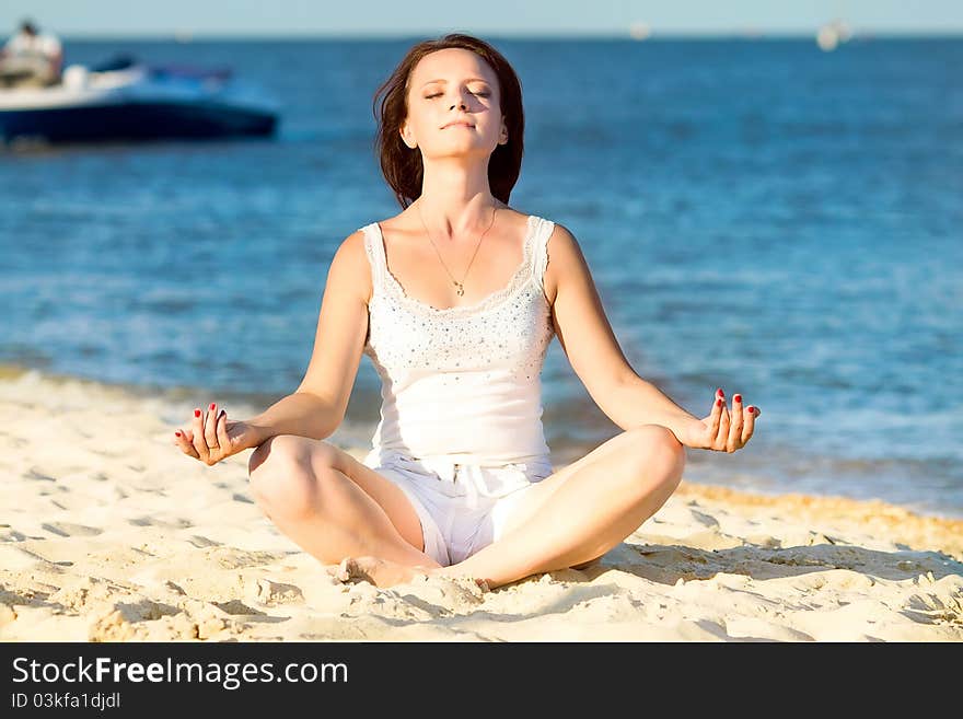 Young beautiful woman during yoga