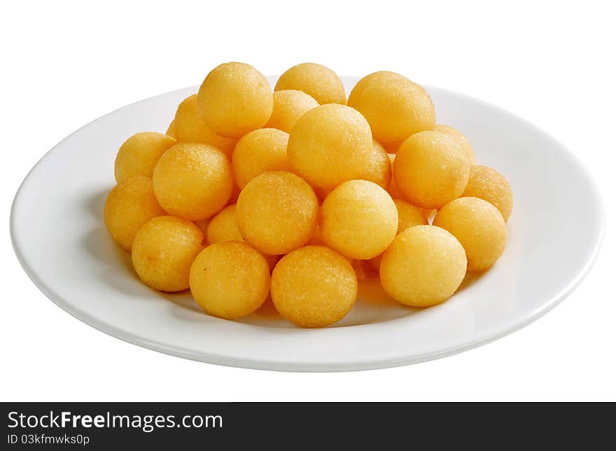 Heap of croquettes on a plate - cut out on white