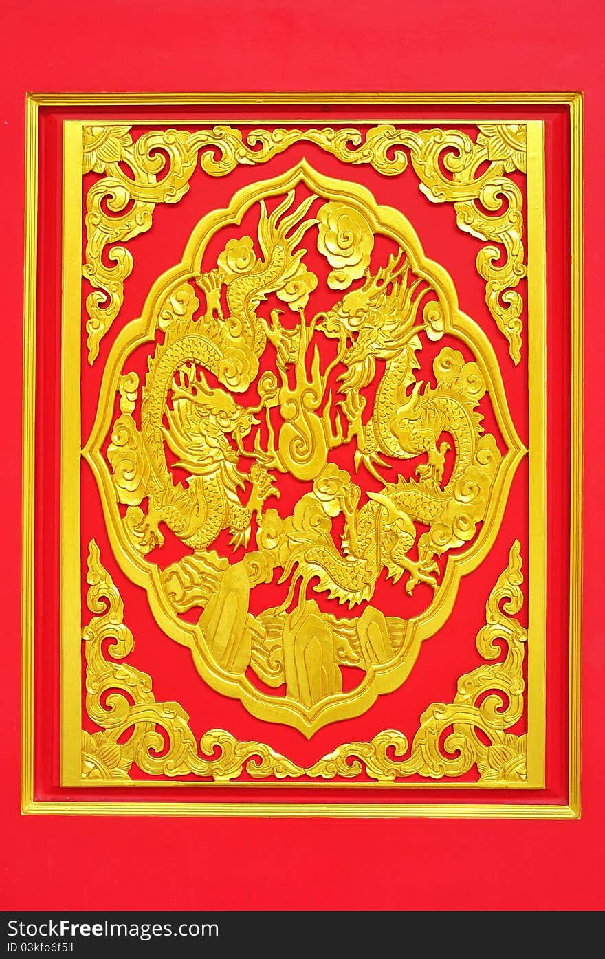 Golden dragon decorated on red wood