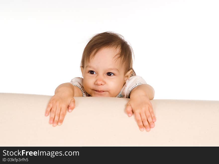 Portrait of a funny baby at sofa. Portrait of a funny baby at sofa