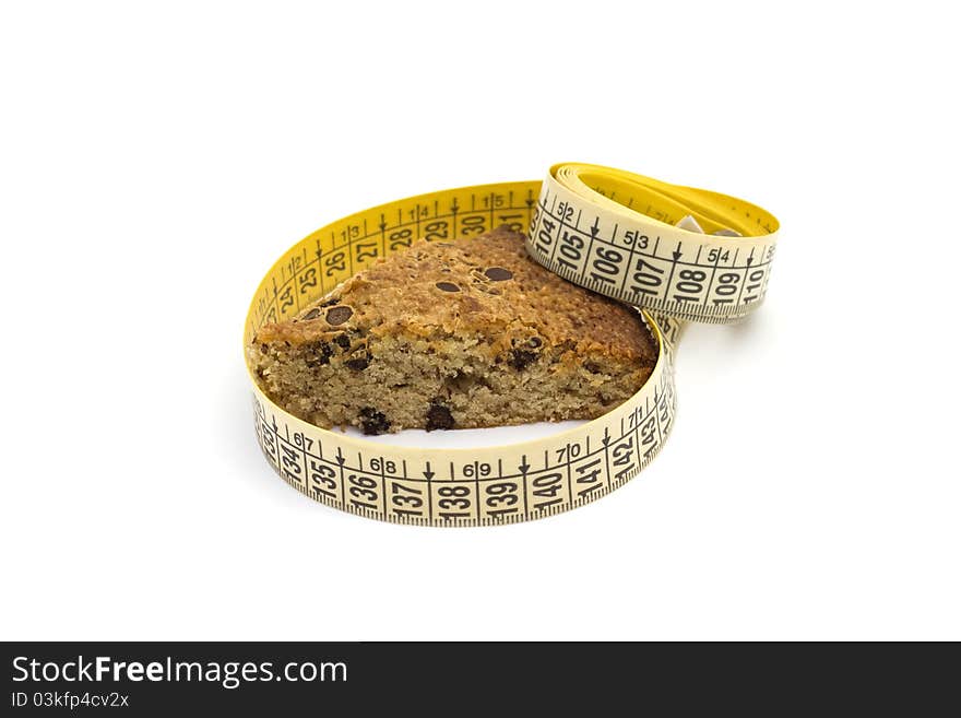 Cake And Measure Tape Isolated On White