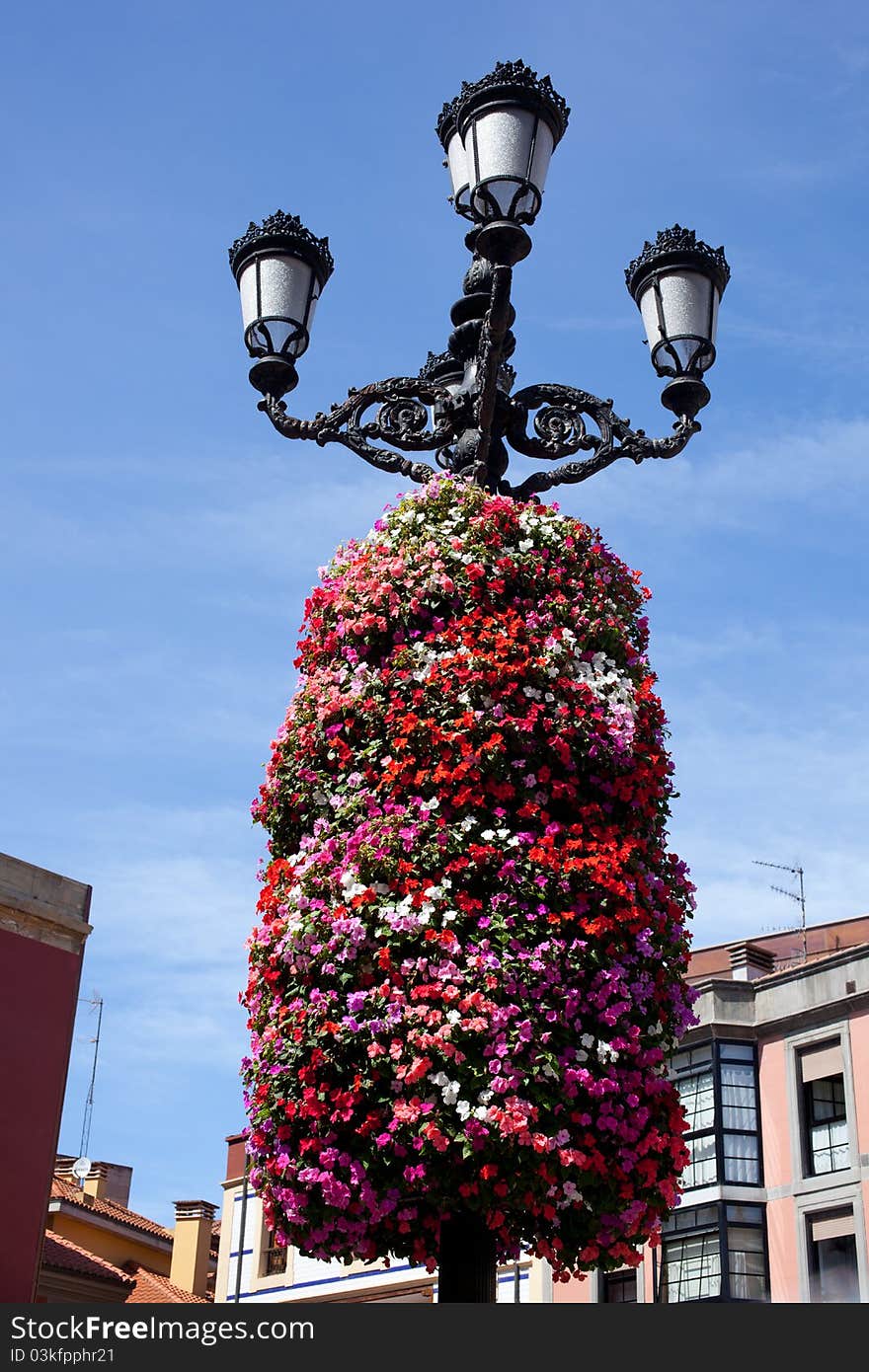 Flower decoration on a street light in Gijon, Asturias