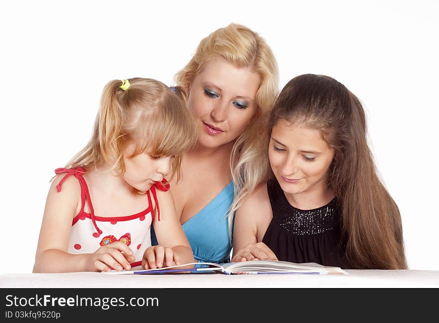 Three girls reading