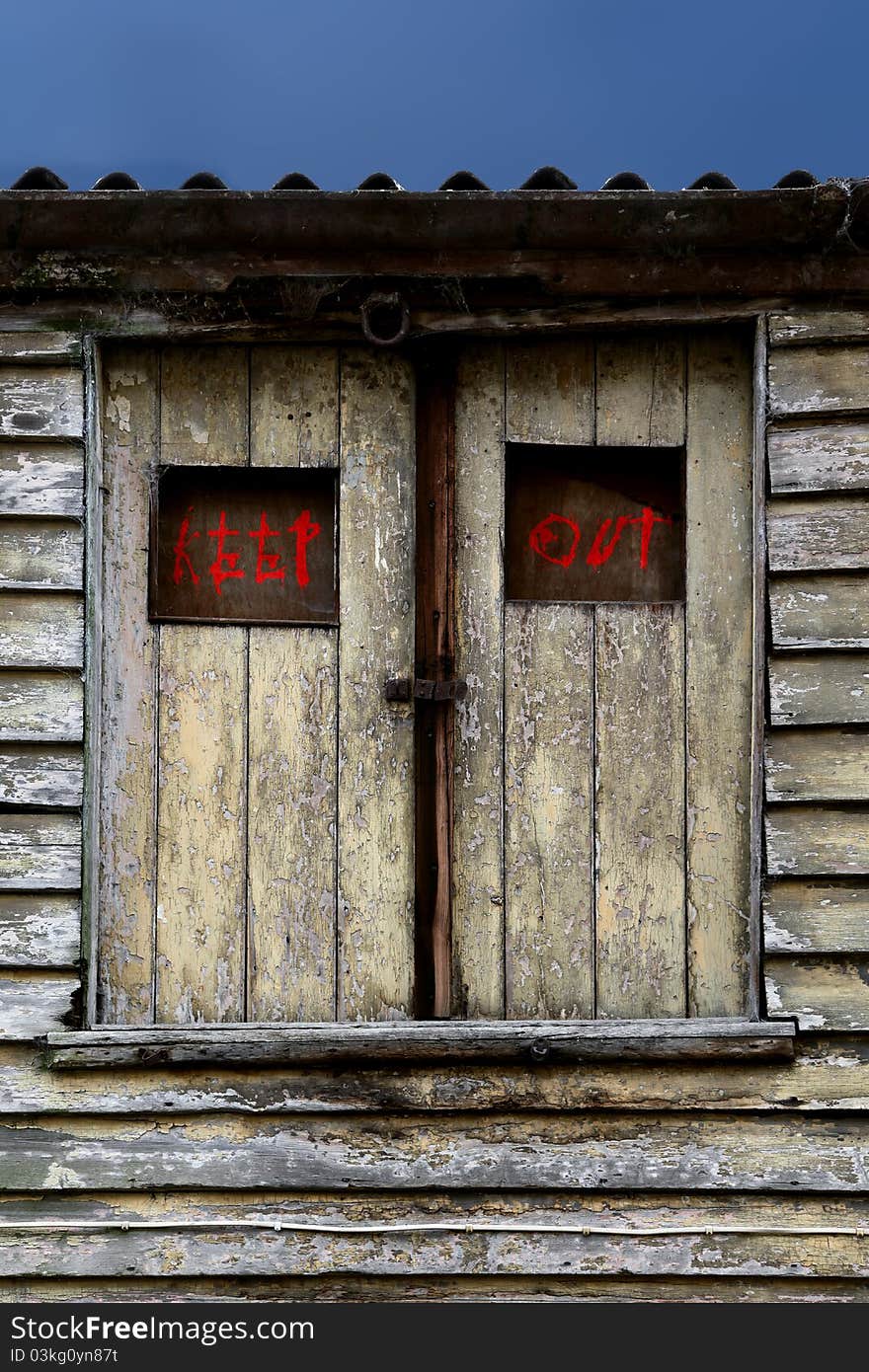 Derelict building with keep out sign