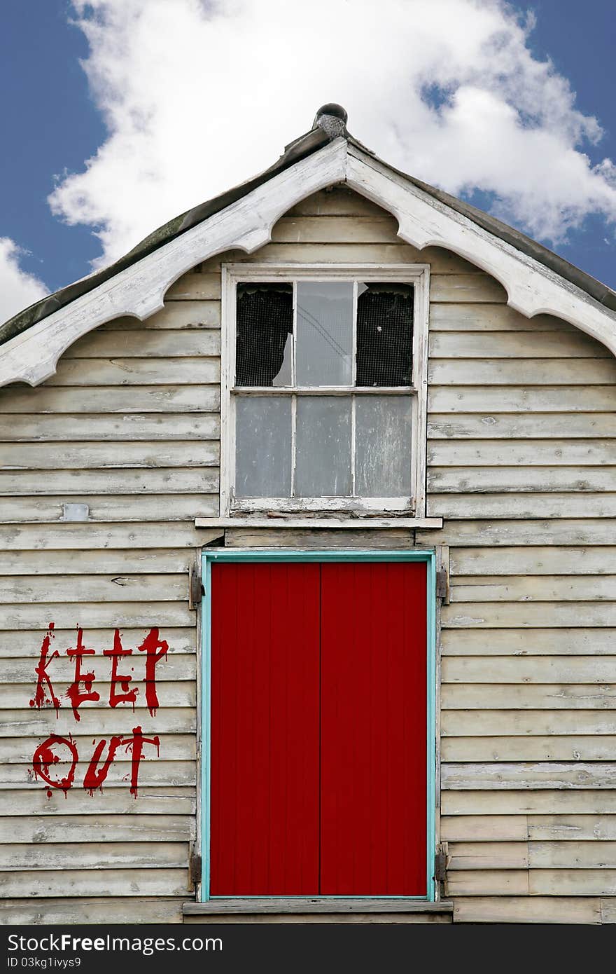 Derelict building with keep out sign