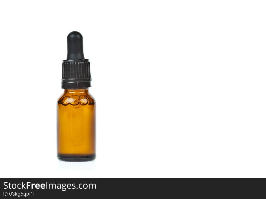 Glass dropper filled with moisturizing concentrate isolated