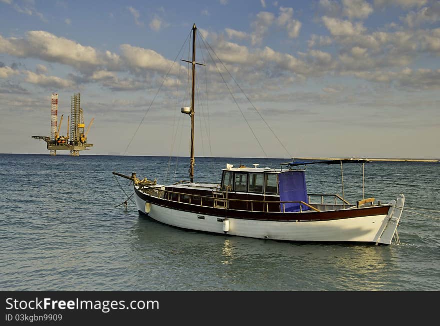 Sailboat And Oil Rig