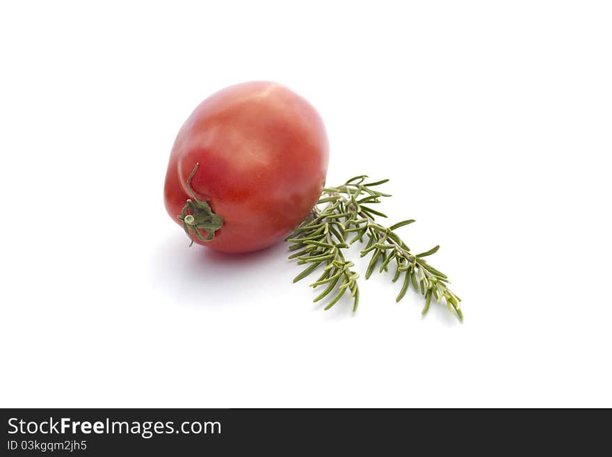 Summer vegetables  on white : tomato and rosemary