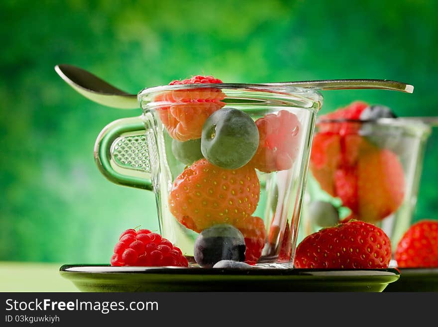 Berries inside a glass cup